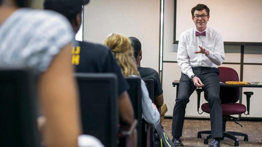 Professor talks to class during lecture